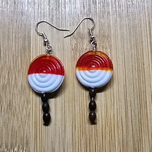 Orange and White Lollipop Earrings with Colorful Circular Design and Bead Detailing