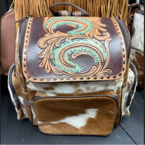 Tooled feathers & cowhide 