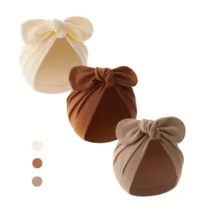 A Set of Three Soft Hats for Newborns, Including a Knotted And Multi-Colored Cotton Bath Hats for Infants