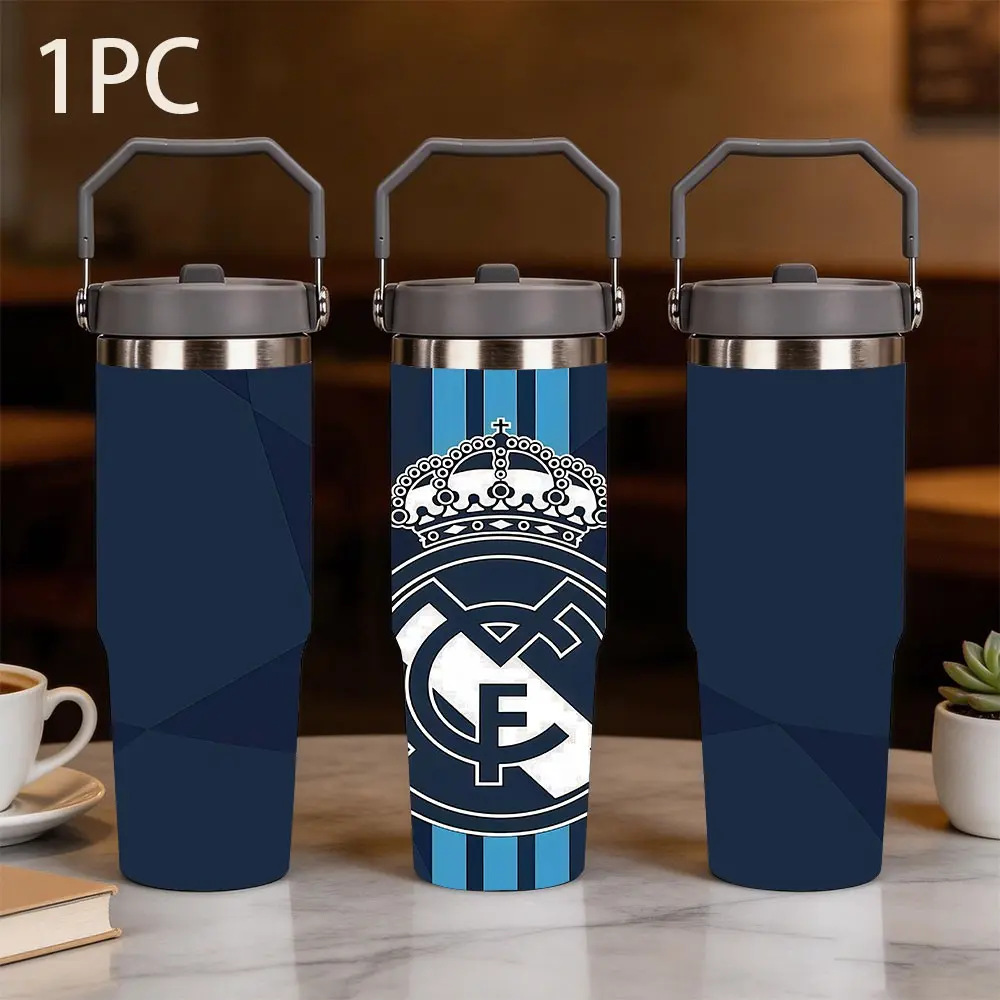 1pc 30oz large-capacity portable thermos cup printed with the emblem of Real Madrid Football Club, featuring deep blue geometric splicing and striped design, is a must-have for Real Madrid fans. It is a portable water cup for daily office and outdoor use