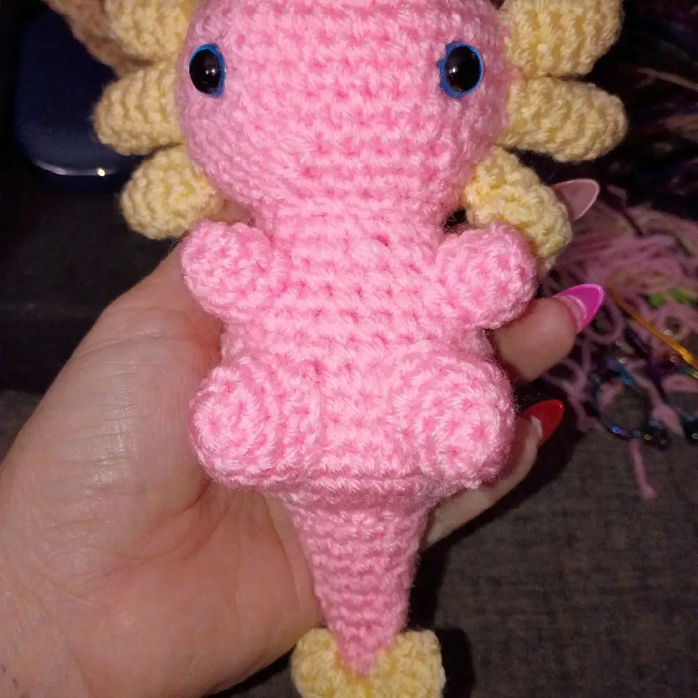 Crochet Axolotl - Pink and Yellow Amigurumi Toy with Blue Eyes and Soft Texture