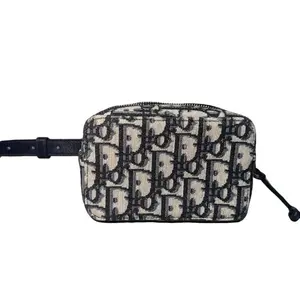 Pre-owned CHRISTIAN DIOR Blue fabric with the signature Dior Oblique pattern Belt Bags Oblique Belt Pouch Blue Canvas with Gold Tone Hardware & Leather Strap Authentic Entrupy Letter Included