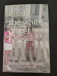 Inside the white picket fence
