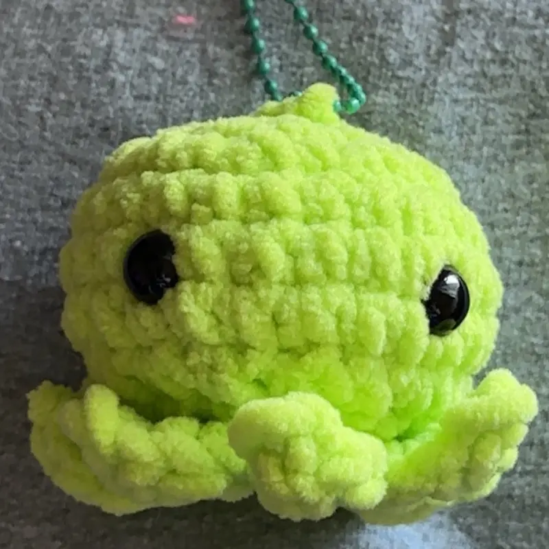 Handmade bright green crochet octopus keychain
