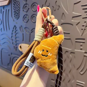 Brown Bread Cute Smiling Croissant Bag Charm Keychain Plush Croissant Charm with Brown Braided Cord for Women's Handbag Accessories Unique Gift for Girls