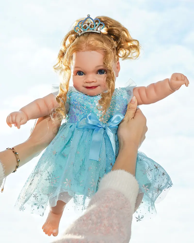VACOS 20inch Reborn Baby Doll: Soft vinyl body with realistic  detailsblonde curls, bright blue eyes, & colorful heart-print outfit.  Perfect for holidays or milestone gifts! - TikTok Shop
