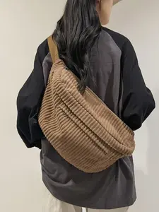 Fashion corduroy material women's crossbody bag, exquisite solid color design, with adjustable shoulder straps, versatile casual backpack, simple and large capacity, suitable for commuting, shopping, and going out.