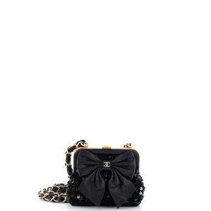 Pre-owned CHANEL Leather, Sequins Clutches & Wristlets Bow Frame Clutch With Chain Sequin Embellished Tweed with Leather Mini by Rebag