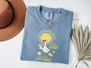 [Sale Up To 50%] Comfort Colors Life Gave Me Some Lemons But My Jesus He Be Makin' Lemonade Silly Goose Shirt, Christian Gift For Women, Faith Apparel