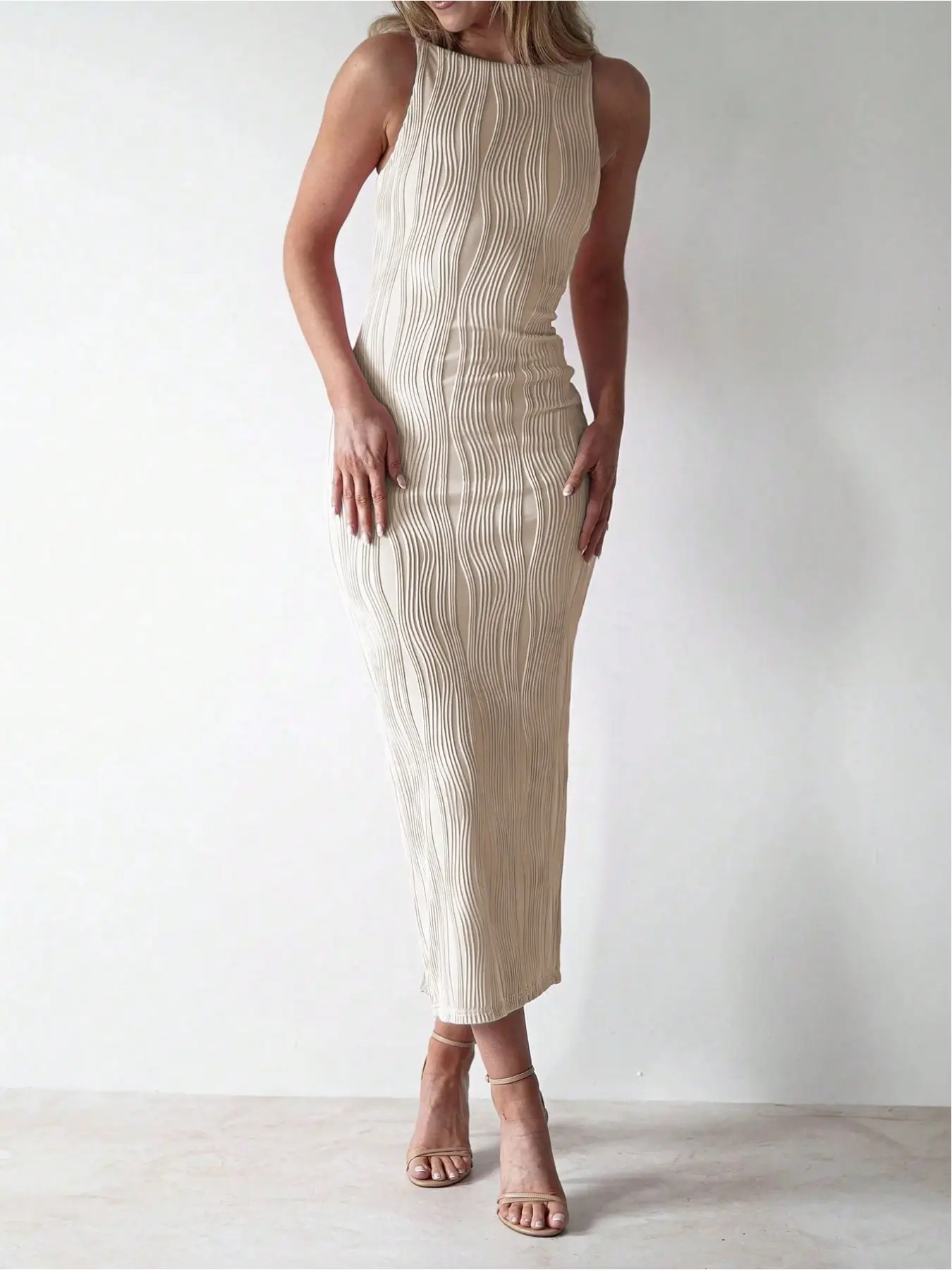 Elegant basic casual Women Summer Sleeveless Fit dress with special texture fabric, simple and unique design, three-dimensional lines, slimming straight midi dress