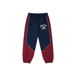 Palace x Gap Nylon Track Bottom Navy/Red (men) by StockX