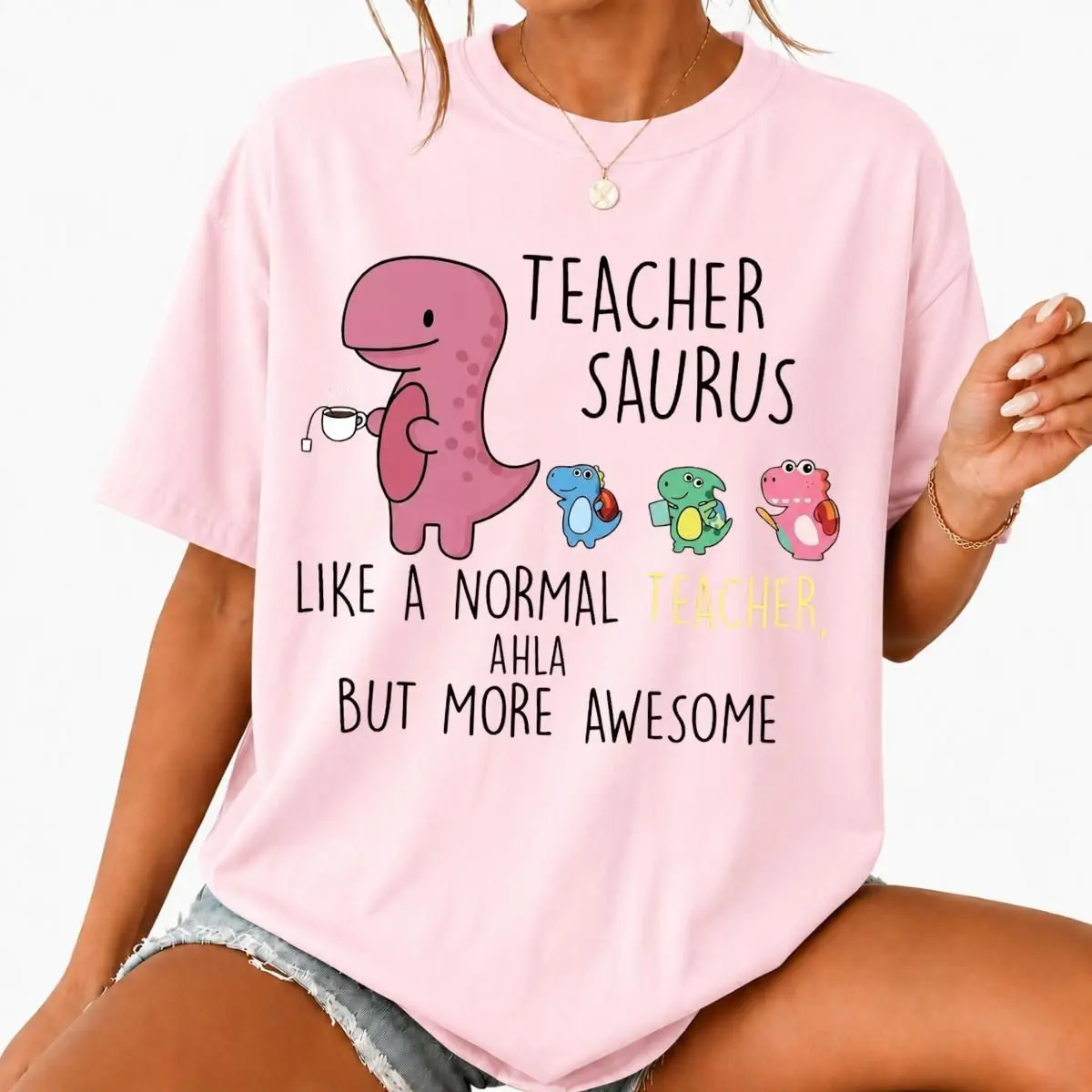 Teacher Saurus Cute Dinosaur Graphic T-Shirt, Funny Back To School Educator Tee, Humorous Teacher Apparel, Front Chest Print Top, Delightful Novelty Gift For Women And Girls Who Love Teaching And School Life