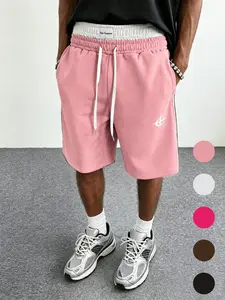 Summer unisex mid-thigh casual athletic shorts with dual waist design, paired with soft fabric for a retro street style look.