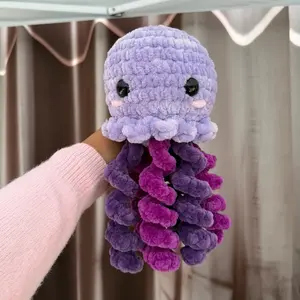 Handmade purple jellyfish crochet plushie