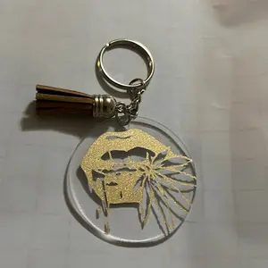 “Maple Leaf” key chain with tassel glittery