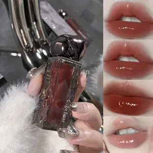 Moisturizing Lip Glaze with a Waterlight End, Featuring Ice Mountain And Lava, Designed to Enhance Color And Provide Hydration.This Colorful Cream Lip Honey Is Perfect Autumn And Winter, Offering a Glossy Glass-Like Appearance