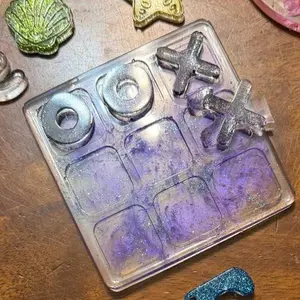 Epoxy Resin Tik Tok Toe Game with Glitter Pieces and Purple Glaze for Creative Play