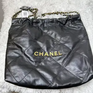 Pre-owned CHANEL Cow Skin Small Leather Goods Black quilted 22 handbag
