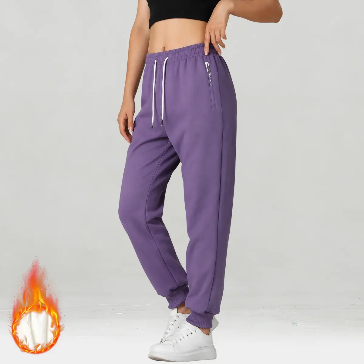 Women’s fleece-lined padded winter pants, loose fit with zippered pockets, warm casual trousers suitable for everyday wear and outdoor activities, ideal as a Christmas gift.