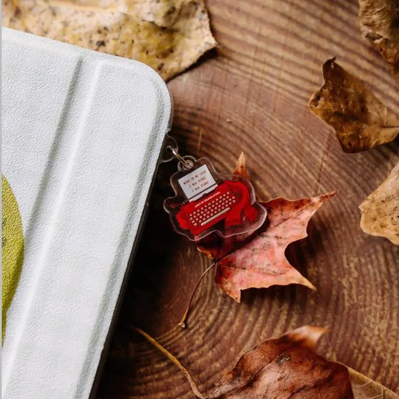Lost in Translation Typewriter E-Reader Charm | Dust Plug Reader Gift
