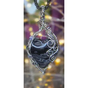 Bless Your Heart – Fossilized Palm Root & Silver Plated Copper Wire Wrapped Pendant