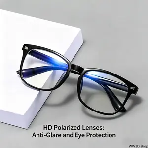 Unisex Blue Light Blocking Glasses: Non-prescription eyewear featuring clear UV400 lenses and stylish retro frames, effectively relieving digital eye strain.