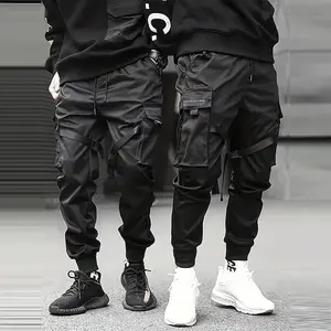 Men’s black techwear work pants — multi-pocket lace-up trousers, suitable for streetwear/casual wear, featuring a multifunctional work pant design and plenty of storage space.