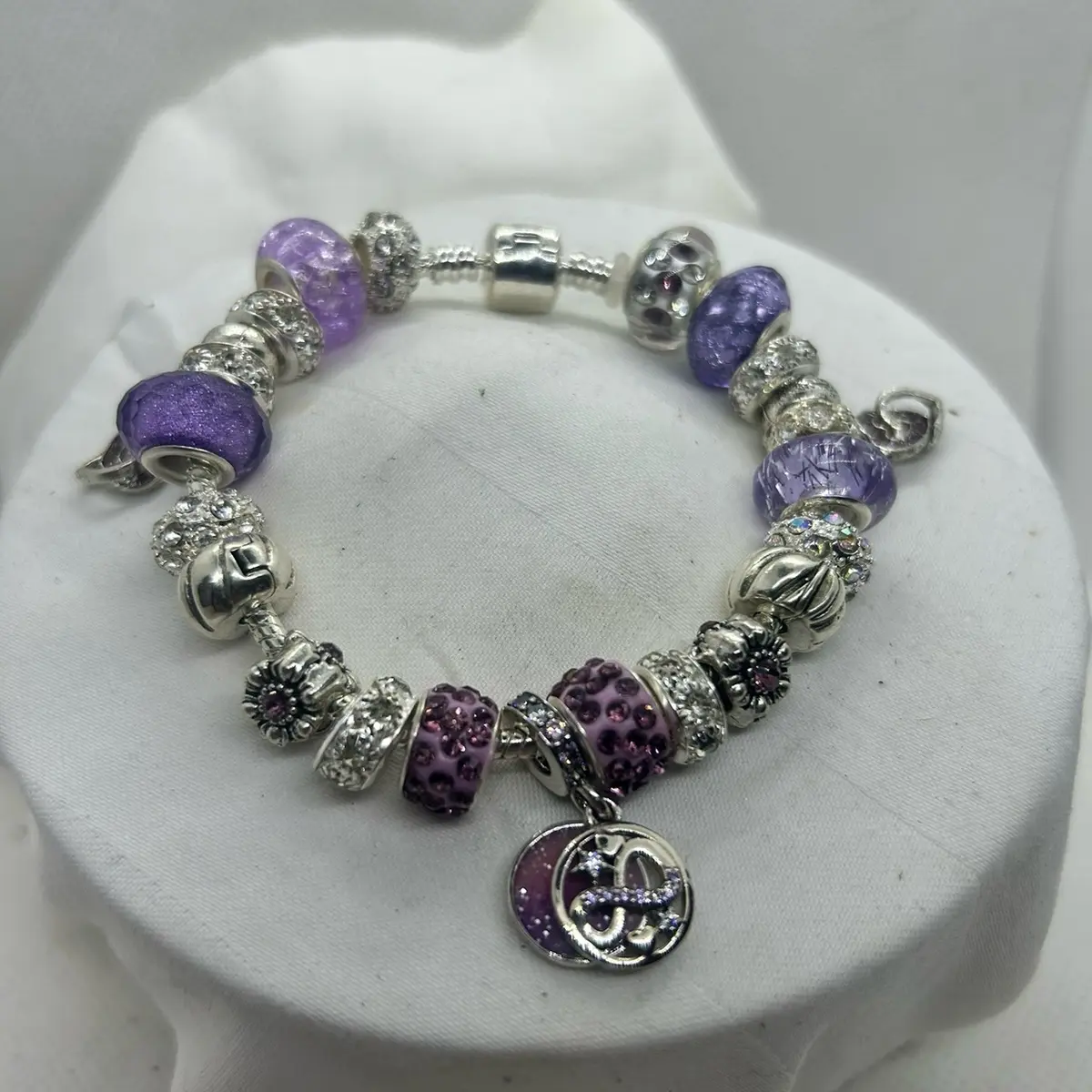 Purple infinity charm bracelet