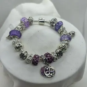 Purple infinity charm bracelet