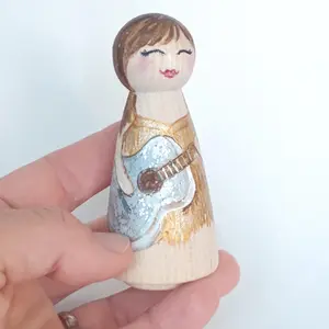 pop star peg doll with sparkly guitar