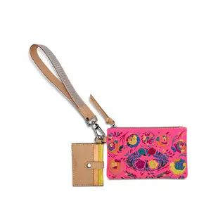 XO COMBI CONSUELA WRISTLET Natural Untreated Leather Wristlet with Vibrant Floral Design and Beige Strap