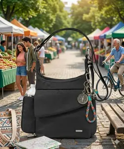 Travel the world with peace of mind, Travelon Anti-Theft Classic Messenger Bag: Slash-resistant, locking straps, & RFID-blocking