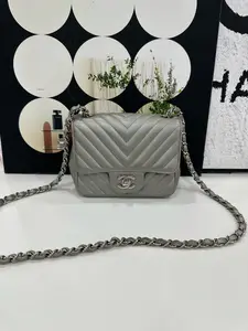 Pre-owned CHANEL Authentic Grey Chevron Caviar Classic Mini Square Flap Bag