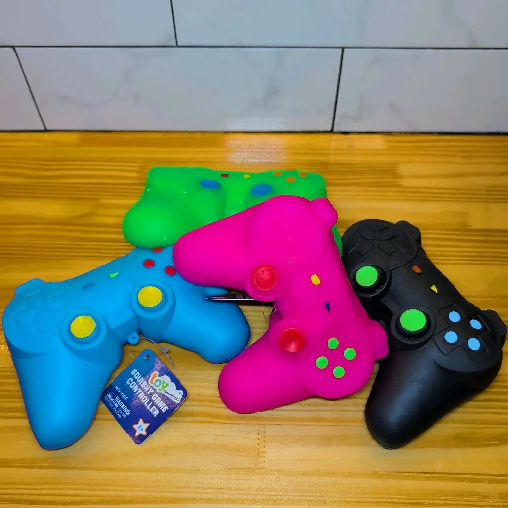 TOYMENDOUS!!  SQUISHY GAME CONTROLLER!!  AGES 3+ VARIOUS COLORS TO CHOOSE.