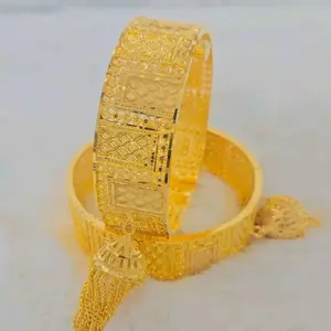 Gold Plated Bangle Set with Intricate Design and Tassel Detail for Elegant Jewelry Collection