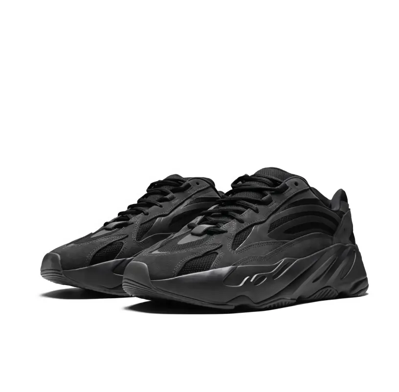 Solid Black Hollow Mesh Low Top Lifestyle Sneakers One Piece Molded Upper Oversized Curved Foam Midsole Minimalist Monotone Fashion Footwear For All Season Daily Outfits ：