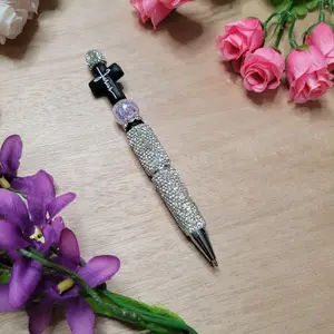 Refillable Rhinestone Pen with Black and White Jesus Design, Full White Rhinestones, and Included Refills