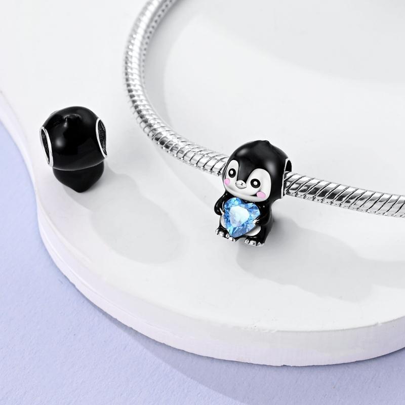 MULA cute penguin holding a heart-shaped pendant, 925 silver-plated inlaid with blue zircon and enamel - can be used with Pandora bracelets and necklaces, a perfect gift for women, girls, children