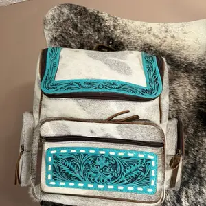 Turquoise tooled leather hair on hide backpack Western