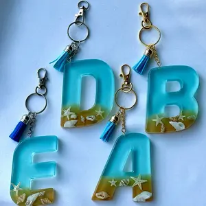 Handmade Personalized Initial Backpack Keychain Ocean Aesthetic Design With Sand, And Seashells