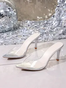 A pair of Women's Pointed Toe Transparent Heel Mules, Clear Strap Design, Stiletto Heel, Ideal for Office, Daily Commute and Casual Wear, Comfortable Fit for All-Day Elegance, Must-Have for Minimalist Wardrobes