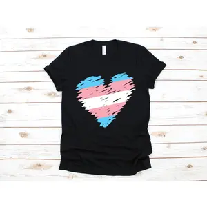 Men's Transgender Pride Heart Graphic T-Shirt - Short Sleeve Crew Neck Regular Fit Casual Wear | Soft & Breathable Fabric, Durable Print, Everyday Comfort, Machine Washable, Casual, flat lay photography, grunge texture design White wooden background