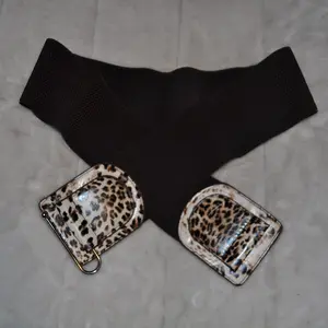 Women's wide leopard print fashion belt featuring a brown elastic strap