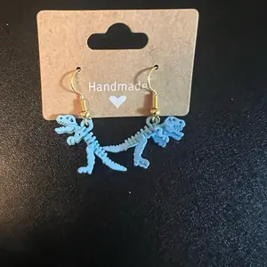 Handmade Blue Dino Skeleton Earrings - Unique Handcrafted Design