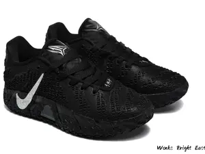 Black Low-Top Basketball Sneakers with Textured Overlay and ZoomX Cushioning
