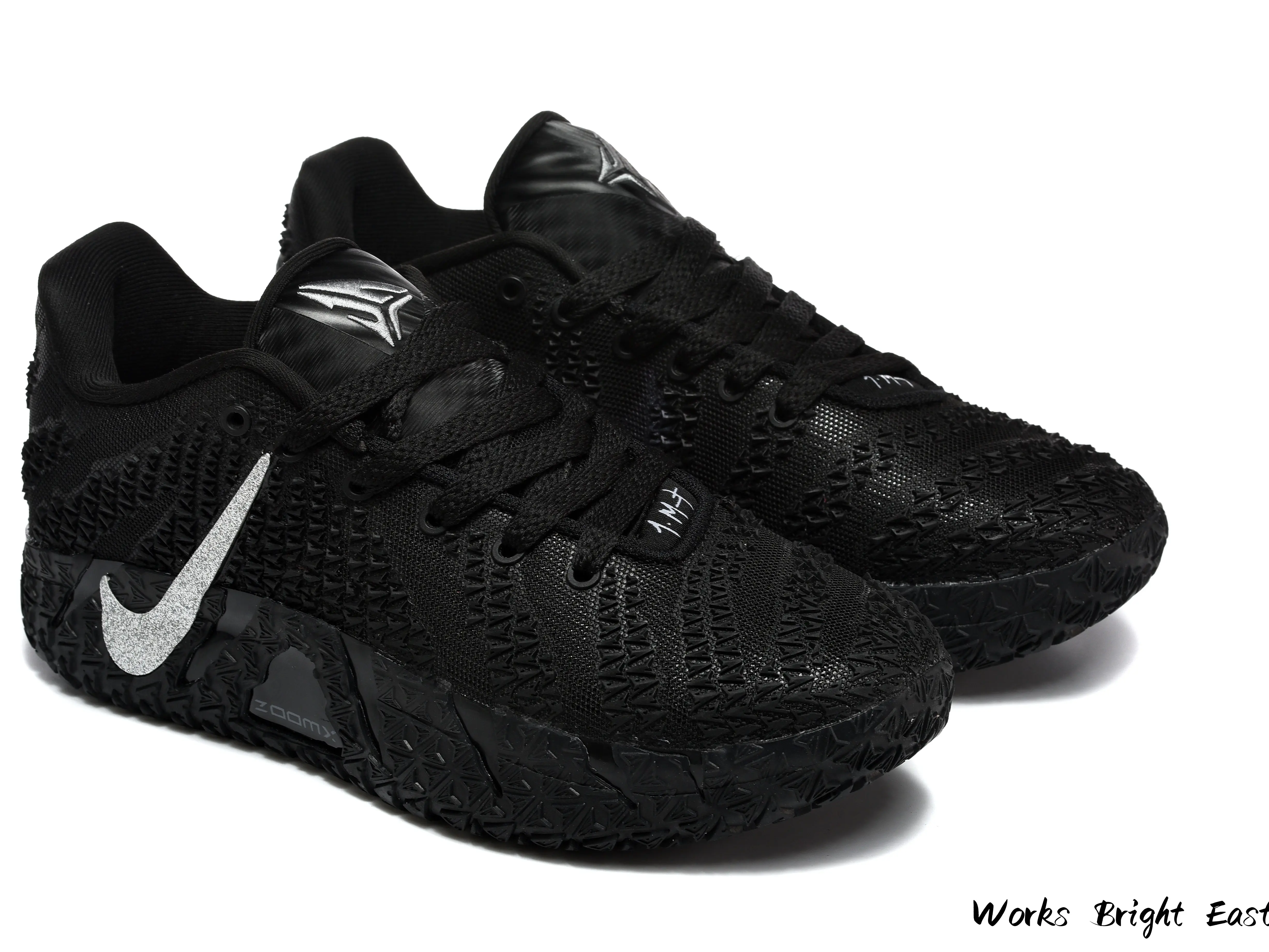 Black Low-Top Basketball Sneakers with Textured Overlay and ZoomX Cushioning