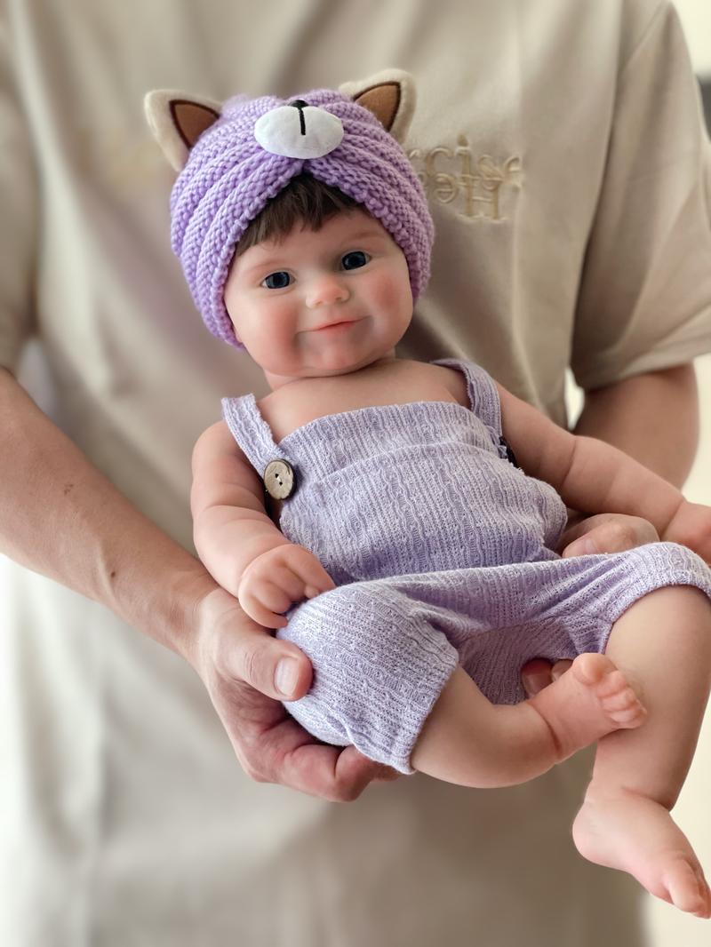 18-inch Rebirth Doll Full Body Soft Silicone Realistic Newborn Girl Doll with Purple Cat Ears Clothes Accessories Perfect Christmas Gift for Collections Holidays Birthdays Halloween Suitable for Children Over 3 Yearsold