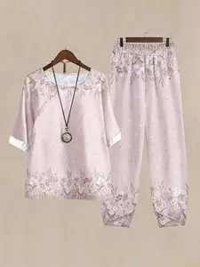 Two-Piece Set Summer 2026 New Round Neck Mid- Sleeve Colorblock Hem Hand-Drawn Large Flower Print Top + Geometric Print Pants, Comfortable and Stylish