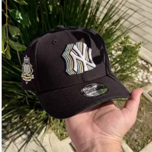 New Era NY Yankees MLB 9FORTY Hat – Black Curved Brim Adjustable Cap Featuring Layered NY Embroidery And Side 100th Anniversary Patch