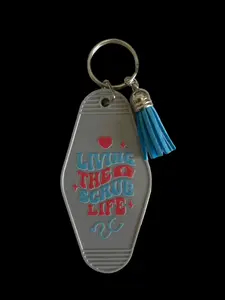 Living The Scrub Life Motel Keychain with Hand-Applied Design and Matching Tassel